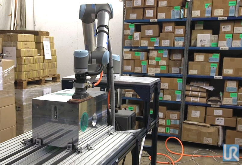 A universal robot in place at All Axis Machining.