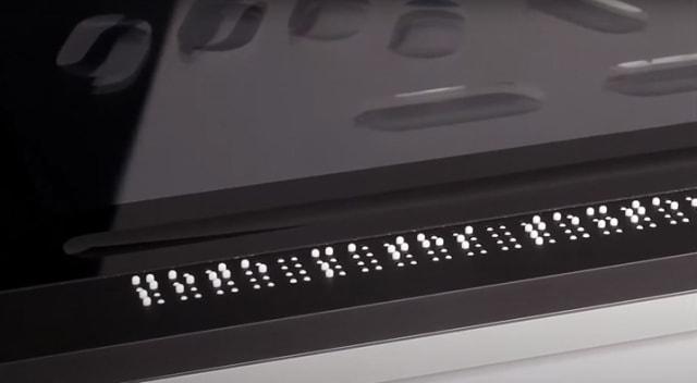 A closeup of the insideONE tactile braille tablet in operation.