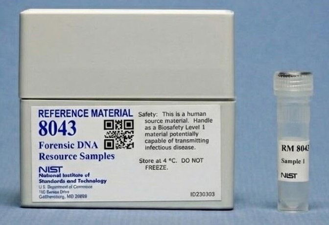 A white box with a small vial displayed next to it; the box is labeled Reference Material 8043 Forensic DNA Resource Samples. The vial says Sample 1.